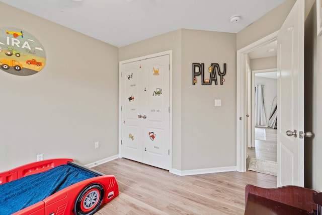 5010 Aspen Ridge Dr, Columbia, MO 65202 - bedroom with wood finished floors and baseboards