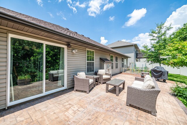4504 Orrine St, Columbia, MO 65201 - fenced backyard featuring an outdoor hangout area, a patio, and grilling area
