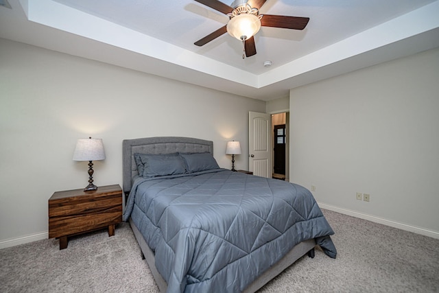4504 Orrine St, Columbia, MO 65201 - bedroom featuring carpet, a tray ceiling, and ceiling fan