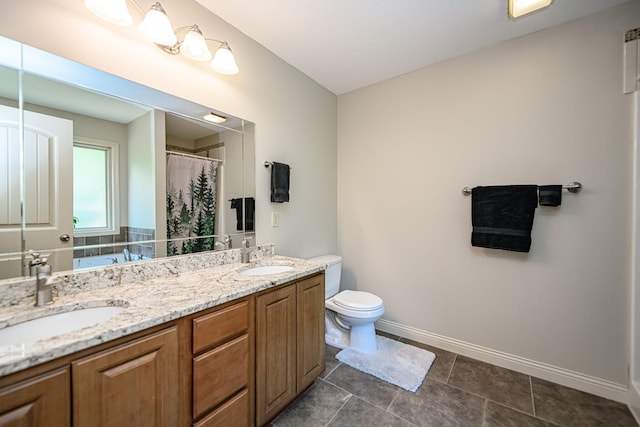 4504 Orrine St, Columbia, MO 65201 - bathroom with double vanity, tile patterned flooring, and a shower with curtain