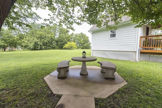 1001 Randolph St, Glasgow, MO 65254 - view of green lawn with a patio and a wooden deck