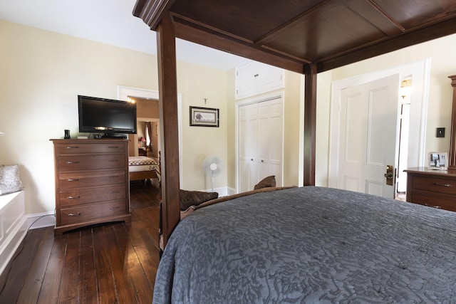 1001 Randolph St, Glasgow, MO 65254 - bedroom with dark wood-style flooring and a closet