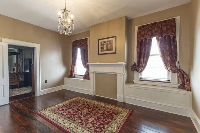 1001 Randolph St, Glasgow, MO 65254 - entryway featuring a chandelier, wood-type flooring, and healthy amount of natural light