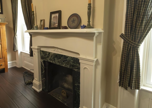 1001 Randolph St, Glasgow, MO 65254 - detailed view of wood finished floors and a fireplace