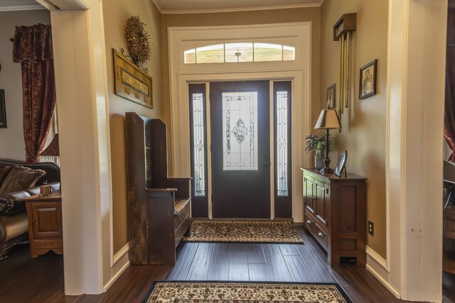 1001 Randolph St, Glasgow, MO 65254 - entrance foyer with dark wood finished floors and crown molding