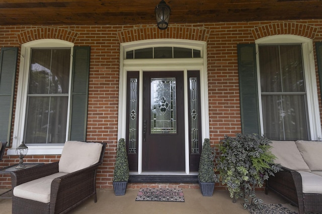 1001 Randolph St, Glasgow, MO 65254 - entrance to property featuring brick siding and covered porch