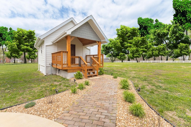 1001 Randolph St, Glasgow, MO 65254 - view of front facade with a wooden deck