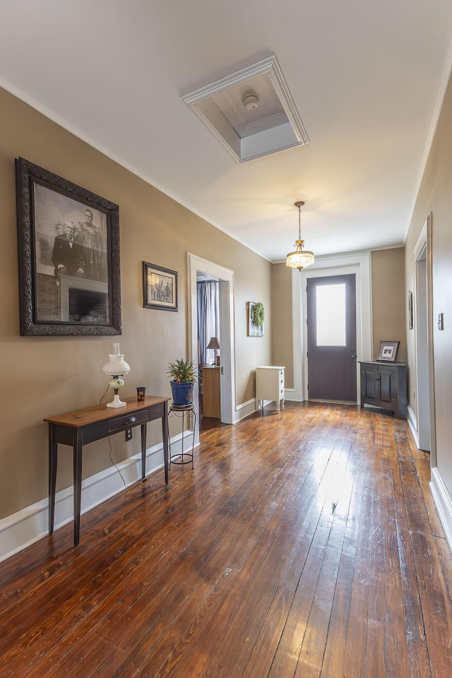 1001 Randolph St, Glasgow, MO 65254 - foyer with wood-type flooring and ornamental molding