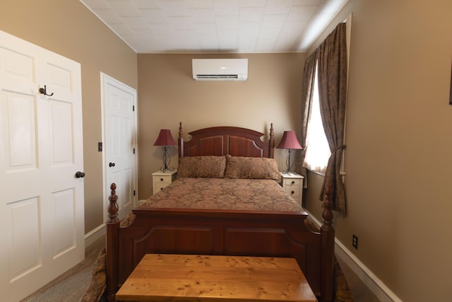 1001 Randolph St, Glasgow, MO 65254 - bedroom with a wall unit AC and baseboards