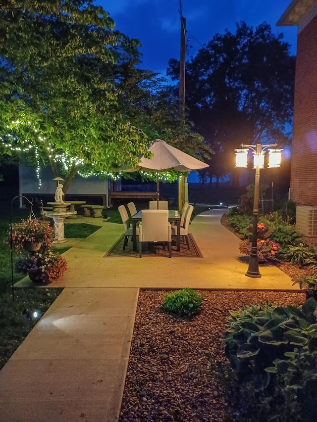 1001 Randolph St, Glasgow, MO 65254 - patio at twilight featuring a patio area