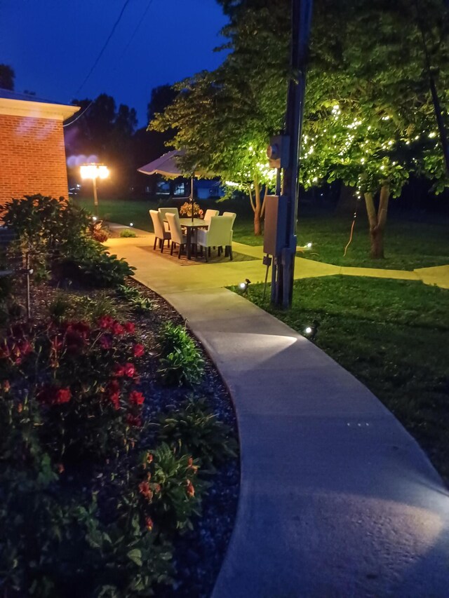 1001 Randolph St, Glasgow, MO 65254 - yard at night featuring a yard