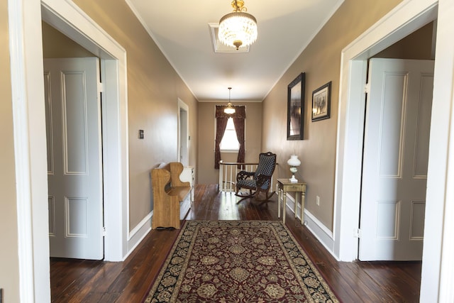 1001 Randolph St, Glasgow, MO 65254 - corridor featuring dark wood-style floors and crown molding