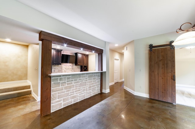 3903 Foxcreek Way, Columbia, MO 65203 - unfurnished living room with a barn door and concrete flooring