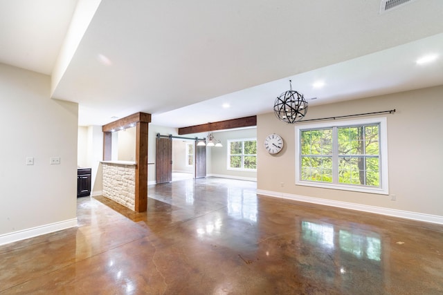 3903 Foxcreek Way, Columbia, MO 65203 - unfurnished living room featuring a barn door, finished concrete floors, a chandelier, and recessed lighting