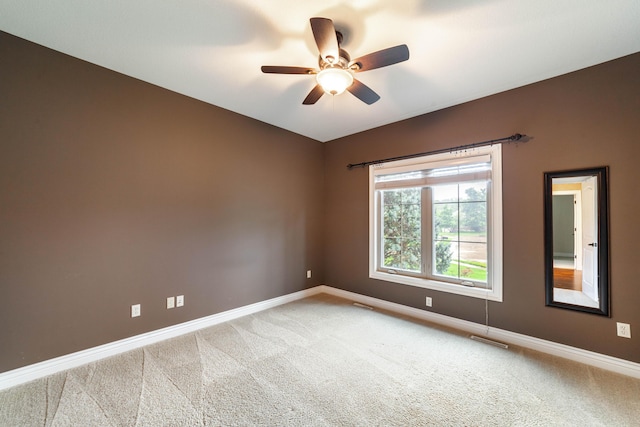 3903 Foxcreek Way, Columbia, MO 65203 - carpeted spare room with baseboards and ceiling fan