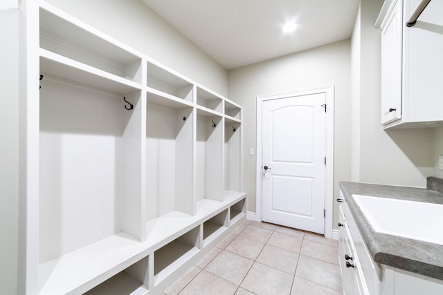 3903 Foxcreek Way, Columbia, MO 65203 - mudroom with light tile patterned floors and a sink