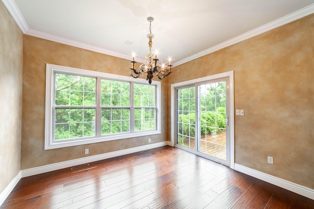 3903 Foxcreek Way, Columbia, MO 65203 - empty room with a chandelier, plenty of natural light, hardwood / wood-style floors, and ornamental molding