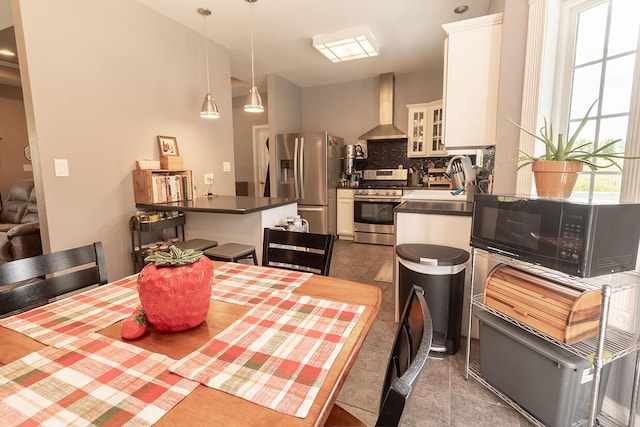 3045 State Rd, Aa, Holts Summit, MO 65043 - dining space featuring dark tile patterned flooring