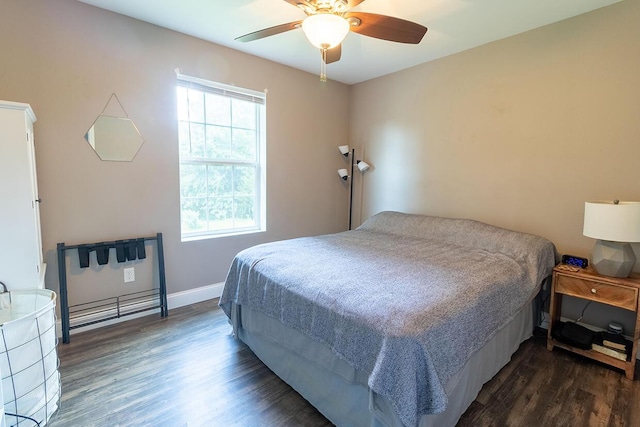 3045 State Rd, Aa, Holts Summit, MO 65043 - bedroom featuring dark wood-type flooring and ceiling fan