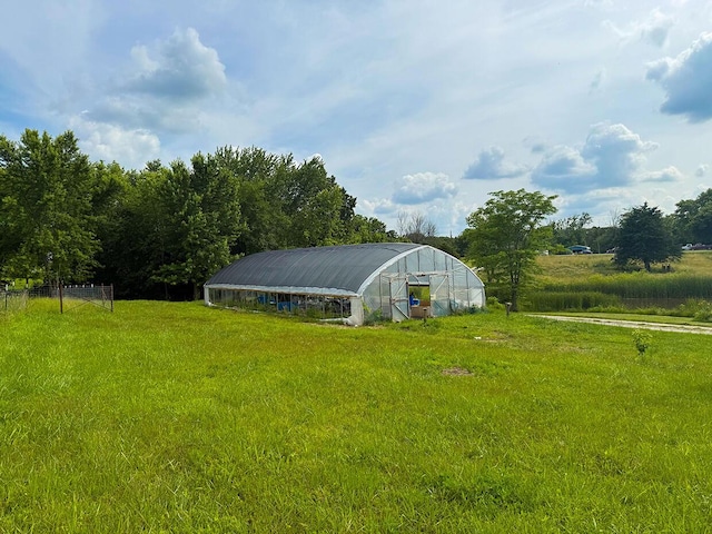 3045 State Rd, Aa, Holts Summit, MO 65043 - view of grassy yard with an exterior structure and an outdoor structure