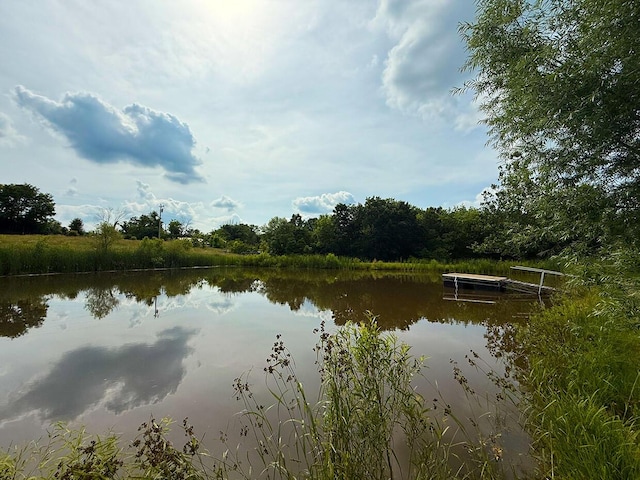 3045 State Rd, Aa, Holts Summit, MO 65043 - water view featuring a boat dock