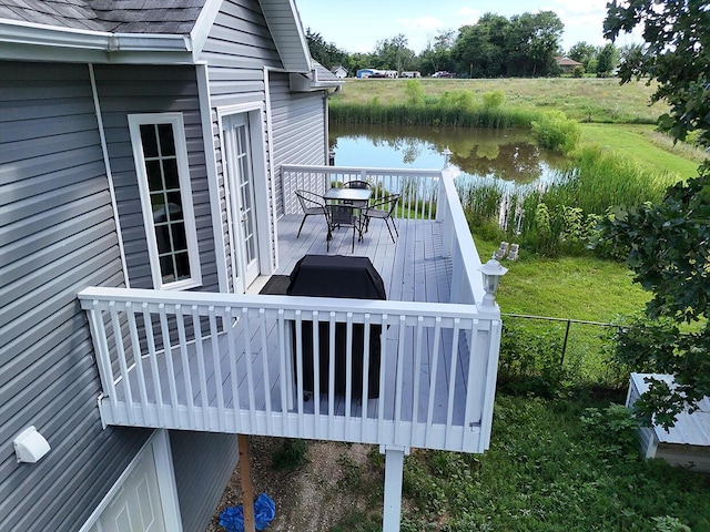 3045 State Rd, Aa, Holts Summit, MO 65043 - wooden terrace with a water view and outdoor dining space
