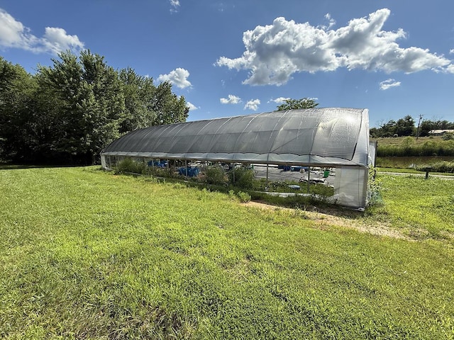 3045 State Rd, Aa, Holts Summit, MO 65043 - view of greenhouse with a lawn