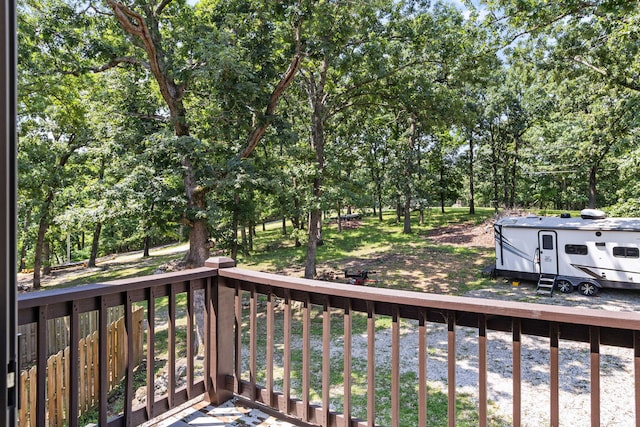 28 Hamilton Way, Sunrise Beach, MO 65079 - wooden terrace with view of wooded area