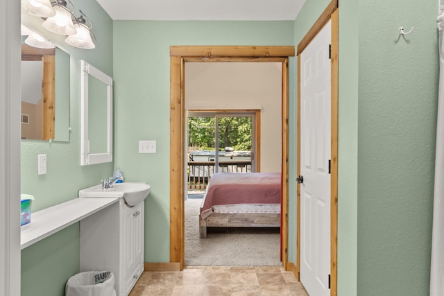 28 Hamilton Way, Sunrise Beach, MO 65079 - bathroom featuring vanity and connected bathroom