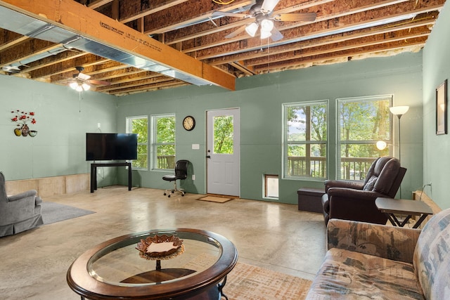28 Hamilton Way, Sunrise Beach, MO 65079 - living room with a ceiling fan and concrete floors