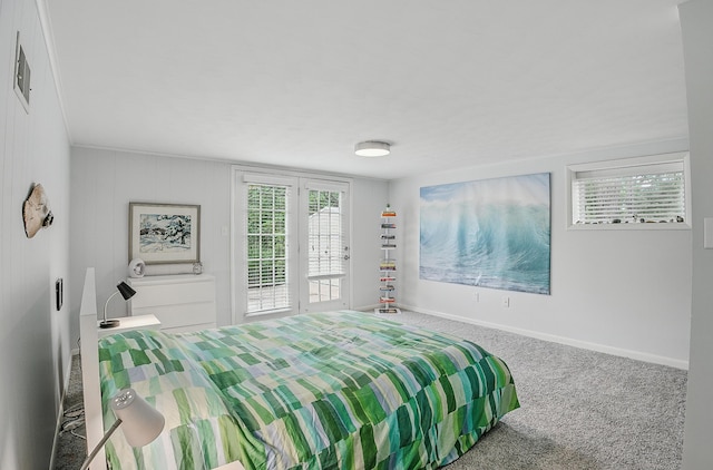 1000 Yale Dr, Columbia, MO 65203 - carpeted bedroom featuring access to exterior and baseboards