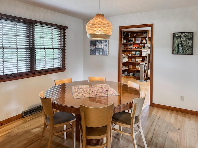 1000 Yale Dr, Columbia, MO 65203 - dining area featuring baseboards and light wood finished floors