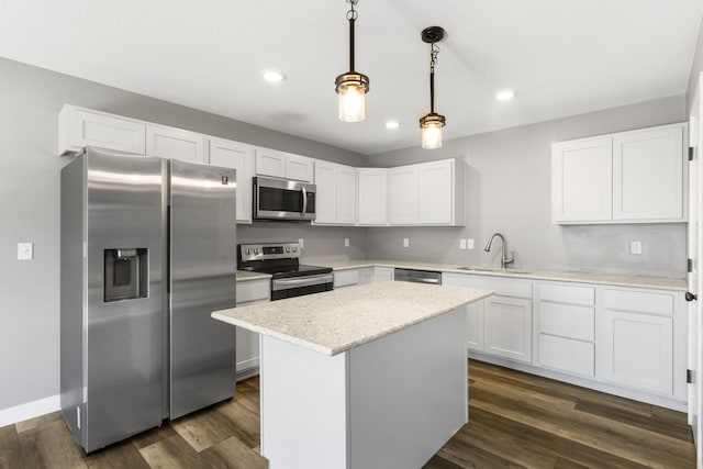 3306 Tuscany, Columbia, MO 65202 - kitchen featuring stainless steel appliances, white cabinets, recessed lighting, and a center island