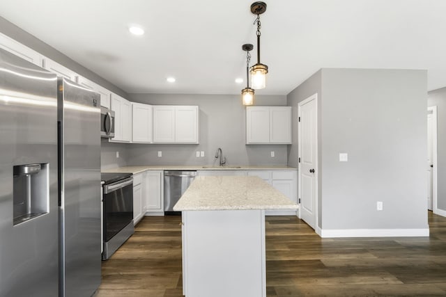 3306 Tuscany, Columbia, MO 65202 - kitchen with stainless steel appliances, a kitchen island, recessed lighting, and white cabinetry