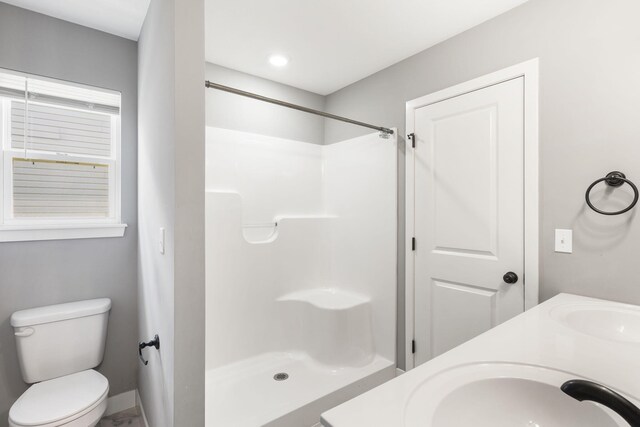 3306 Tuscany, Columbia, MO 65202 - bathroom with a shower, double vanity, and recessed lighting