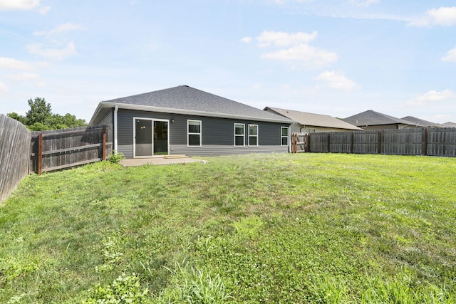 3306 Tuscany, Columbia, MO 65202 - rear view of property with a fenced backyard and a patio area