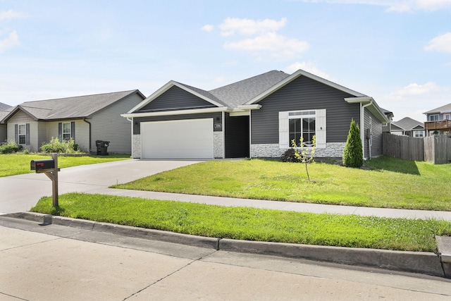 3306 Tuscany, Columbia, MO 65202 - view of front of property featuring a garage, concrete driveway, and stone siding