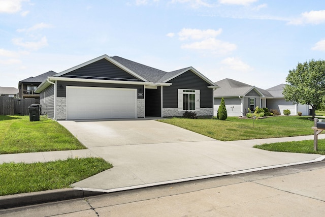 3306 Tuscany, Columbia, MO 65202 - view of front of property featuring an attached garage, concrete driveway, and stone siding