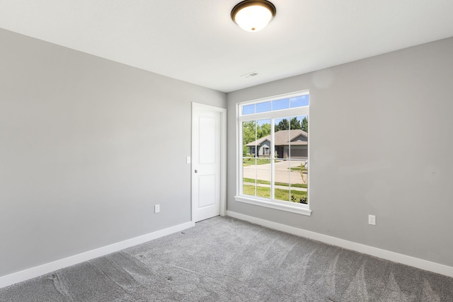 3306 Tuscany, Columbia, MO 65202 - carpeted spare room with baseboards
