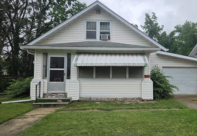 809 E Love St, Mexico, MO 65265 - view of front of home featuring entry steps, a front lawn, a garage, and a shingled roof