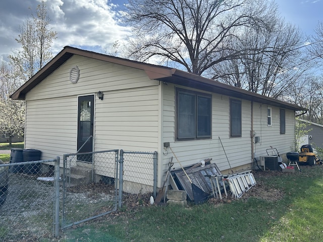 6009 E Eric Ln, Columbia, MO 65202 - rear view of house with a gate