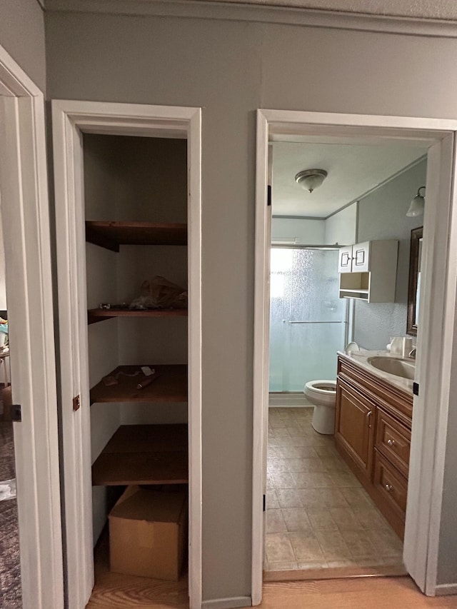 6009 E Eric Ln, Columbia, MO 65202 - full bathroom featuring vanity and a shower with shower door