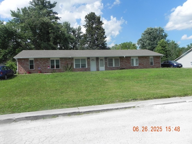 2601 E Oakbrook Dr, Columbia, MO 65202 - single story home featuring a front lawn and brick siding