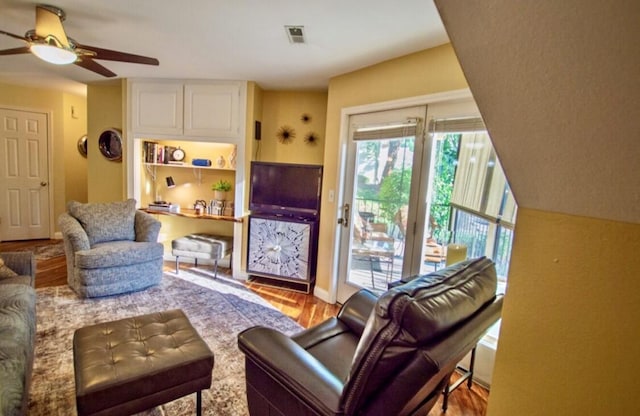 1902 Park Deville Pl, Columbia, MO 65203 - living room with wood finished floors and a ceiling fan