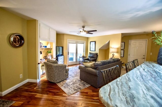 1902 Park Deville Pl, Columbia, MO 65203 - living room featuring ceiling fan and dark wood-type flooring
