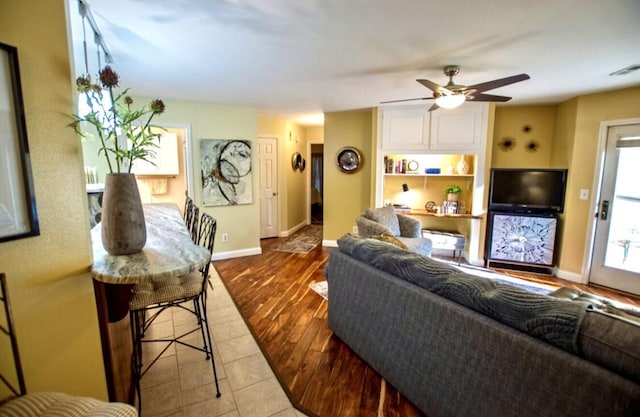 1902 Park Deville Pl, Columbia, MO 65203 - living room with a ceiling fan and wood finished floors