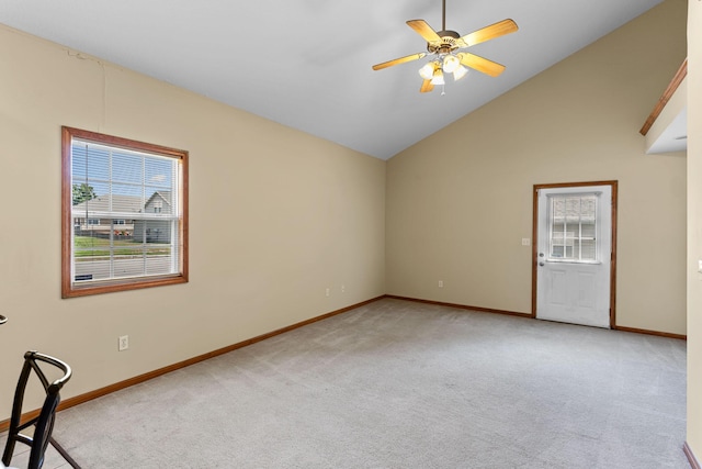 2208-2210 Shamrock Dr, Columbia, MO 65202 - empty room featuring light colored carpet, healthy amount of natural light, a ceiling fan, and lofted ceiling