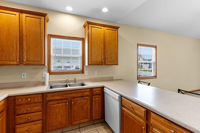 2208-2210 Shamrock Dr, Columbia, MO 65202 - kitchen with dishwasher, brown cabinetry, light countertops, and recessed lighting