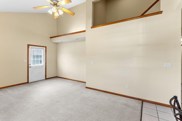 2208-2210 Shamrock Dr, Columbia, MO 65202 - carpeted spare room with a ceiling fan and a towering ceiling
