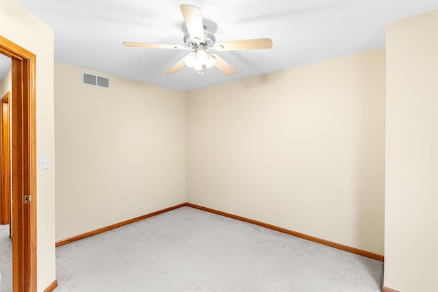 2208-2210 Shamrock Dr, Columbia, MO 65202 - spare room featuring light colored carpet and a ceiling fan